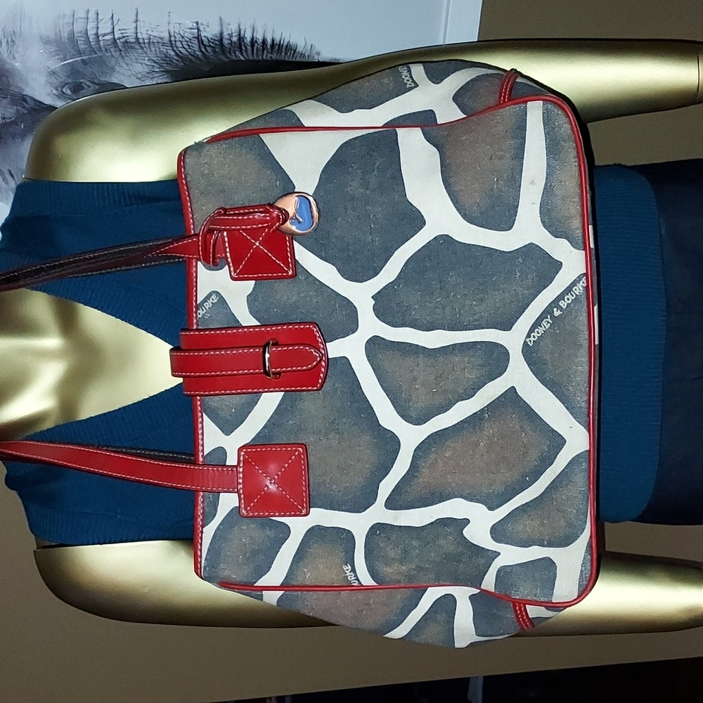 Dooney  & Bourke red and giraffe print canvas bag.